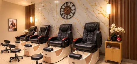 A row of pedicure chairs